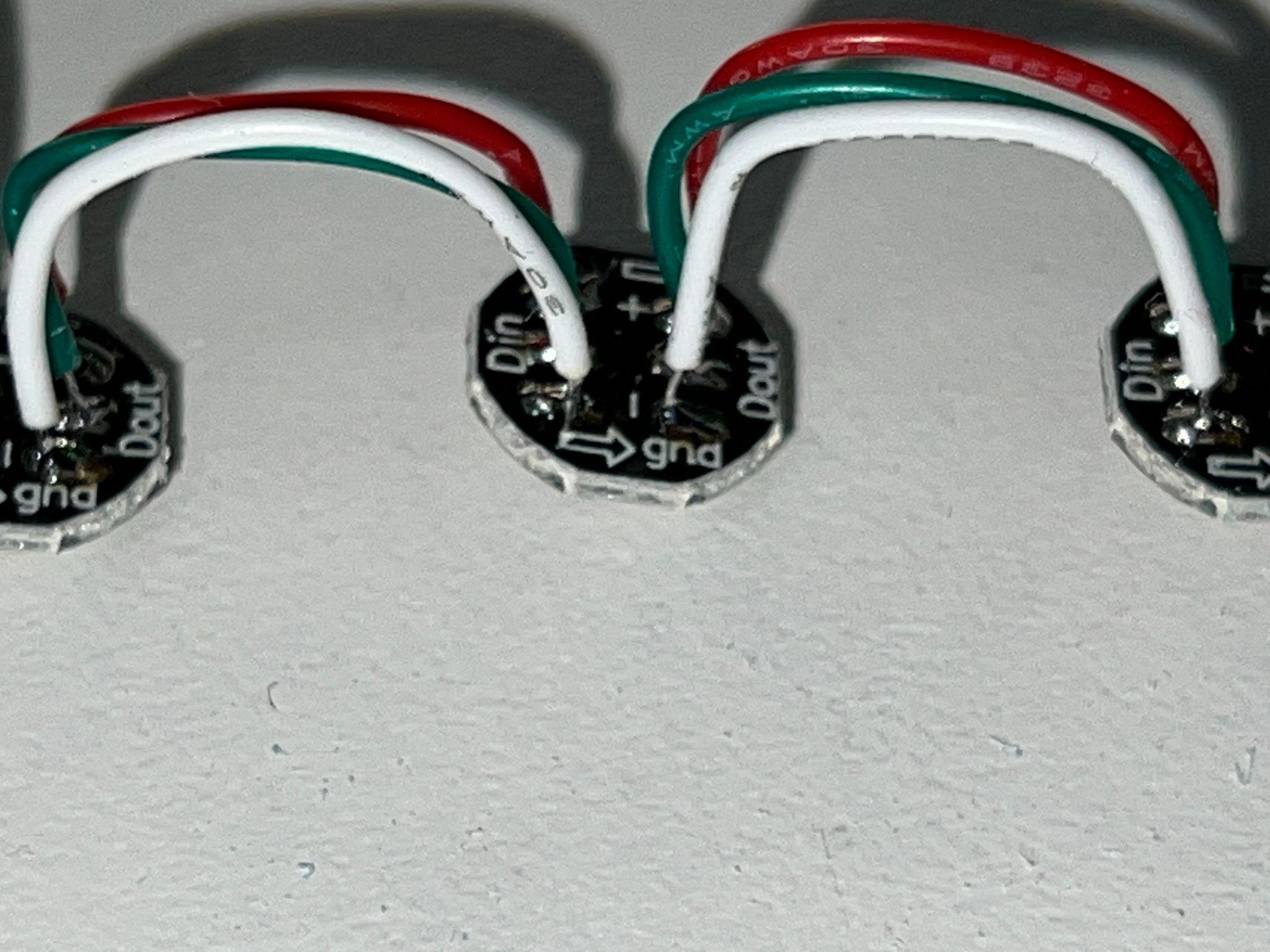 LED wires soldered vertically for clean gate insertion